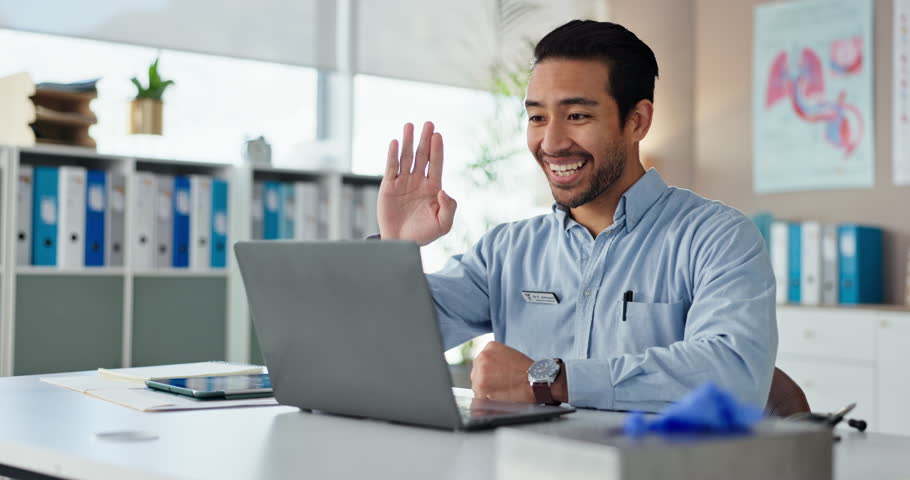 Doctor, laptop and video call in office for healthcare diagnosis, patient and wellness consulting. Asian man, tech and telehealth as gp for treatment plan, eprescription and medical advice with wave