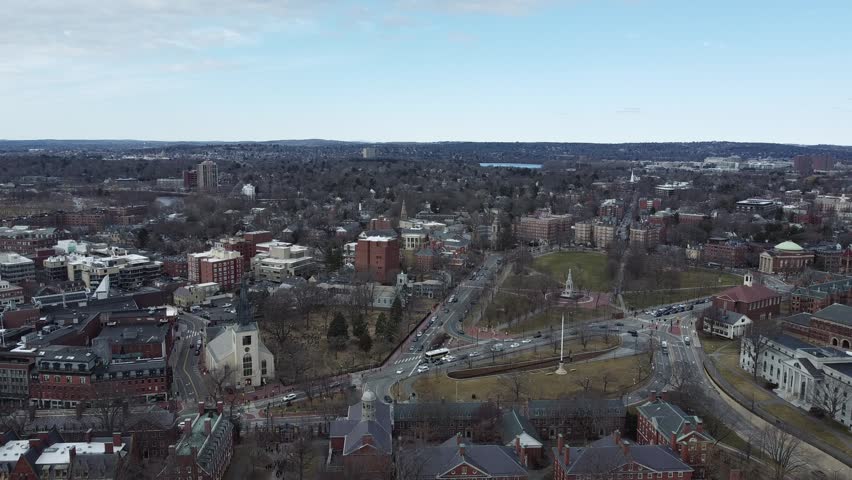 Aerial view of Cambridge, Massachusetts, from Harvard University, showcasing the rich blend of historic academic buildings and modern cityscape, with the vibrant atmosphere of this renowned city