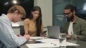 Diverse multiethnic group coworkers Indian Caucasian colleagues male female men woman business partners agents workers businessmen businesswoman work online laptop phone paperwork office desk teamwork - Powered by Shutterstock - Get 15% off with code: PIKWIZARD15