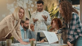 Business team disagreement argue conflict office coworking group angry toxic men women female male architects shout scream quarrel misunderstanding documents problem tired man colleague feel stress - Powered by Shutterstock - Get 15% off with code: PIKWIZARD15