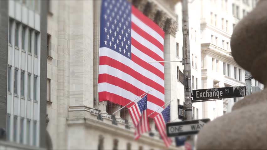 New York City, United States. Lower Manhattan Downtown Financial District. American Wall street. Exchange and Broad corner road traffic sign. Stock Exchange, USA Stock Market. Crossroad intersection.