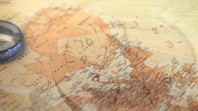 Animation of clock moving over compass and map. Time, travel and digital interface concept digitally generated video. - Powered by Shutterstock - Get 15% off with code: PIKWIZARD15