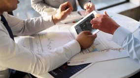 Team member exchanges and discuss business strategies and marketing plans - Powered by Shutterstock - Get 15% off with code: PIKWIZARD15