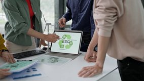 Young Asian business team discussion reusable product in office,start up eco-friendly business,environmental protection,sustainable business model,ESG strategy,team meeting,people work at home concept - Powered by Shutterstock - Get 15% off with code: PIKWIZARD15