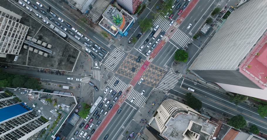 Aerial view of bustling Paulista Avenue with skyscrapers and busy traffic, Sao Paulo, Brazil.