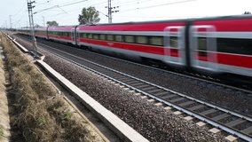 Europe, Italy , Milan 09,14,2024  - Frecciarossa Trenitalia  Hight speed 300km h train railway  view from the drone - the faster way to travel in Italy from Milan to Rome. A1 motorway , cars and train - Powered by Shutterstock - Get 15% off with code: PIKWIZARD15