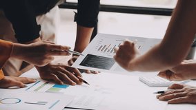 Business team collaboration discussing working analyzing with financial data and marketing growth report graph in team, presentation and brainstorming to strategy planning making profit of company. - Powered by Shutterstock - Get 15% off with code: PIKWIZARD15