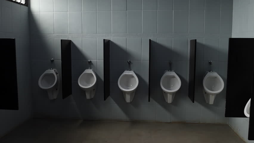 Urinals in mens bathroom - empty establishing shot