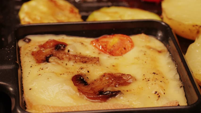 French Swiss or Spanish restaurant with traditional tapas food, Spanish cuisine, delicious tapas and cheese plate, bruschetta with cheese, olives dry tomatoes and tasty sandwich bar appetizer, buffet