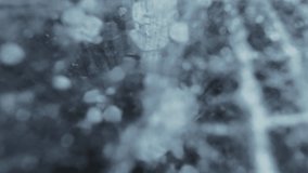 Close up of white bubbles and ice cracks in the frozen lake. Winter abstract elements.  - Powered by Shutterstock - Get 15% off with code: PIKWIZARD15