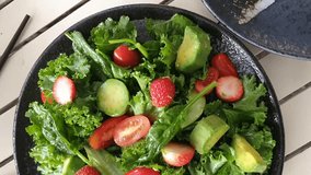 Food processing from fresh raw ingredient for healthy eating, mix salad with vegetable dressing, avacado, baby spinach, crytal letture, cherry tomato, vegetarian vibrant meal - Powered by Shutterstock - Get 15% off with code: PIKWIZARD15