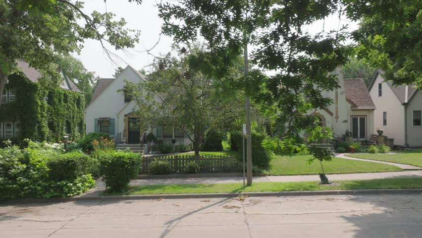 Aerial view capturing old residential homes in Minneapolis suburb neighborhood in USA.