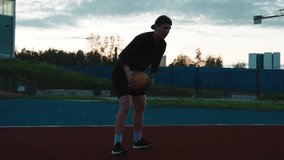 Female High School Basketball woman Playing basketball Game, throwing a ball into ring. Caucasian teenager girl basketball player dribbling practicing shots on outdoor court in the evening on sunset - Powered by Shutterstock - Get 15% off with code: PIKWIZARD15