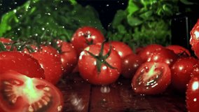 Fresh tomatoes with a splash of water. Filmed on a high-speed camera at 1000 fps. High quality FullHD footage - Powered by Shutterstock - Get 15% off with code: PIKWIZARD15