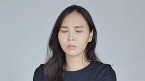 asian woman suffering from irritated eye; concept of optical health care, red eye allergy, eye care, allergic or itching or dry eye inflammation; young adult asian woman model - Powered by Shutterstock - Get 15% off with code: PIKWIZARD15