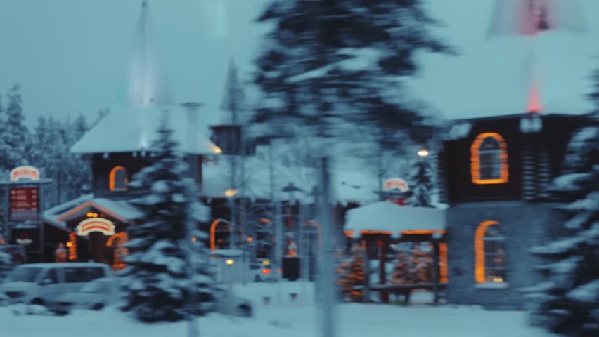 Driving past Santa Claus' Village in winter in Rovaniemi, Lapland, graded, snowy - Powered by Shutterstock - Get 15% off with code: PIKWIZARD15