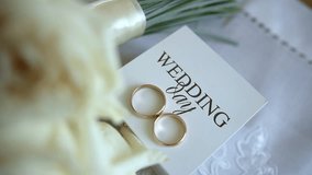 Close up of wedding rings on a stylish box, slow motion camera - Powered by Shutterstock - Get 15% off with code: PIKWIZARD15
