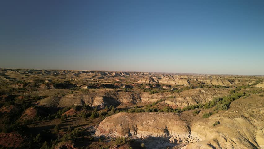 Aerial above Badlands in Medora North Dakota at sunset