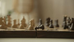 Chessboard with fallen black king amidst white and black chess pieces - Powered by Shutterstock - Get 15% off with code: PIKWIZARD15