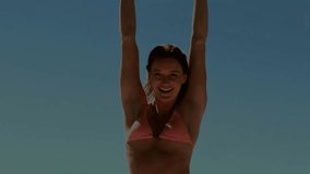 Animation of financial data processing over happy caucasian woman in bikini in summer. Global vacation, finance, business, connections, computing and data processing concept digitally generated video. - Powered by Shutterstock - Get 15% off with code: PIKWIZARD15