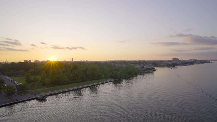 An elevated view of historic Old Town Alexandria Virginia and the Potomac River at sunset.