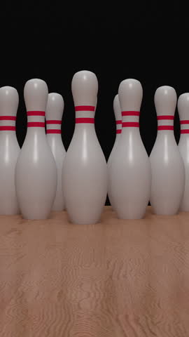 The bowling ball travels down the bowling alley, hits and knocks down the bowling pins. Bowling strike. Concept of achieve goals and win. Vertical video.