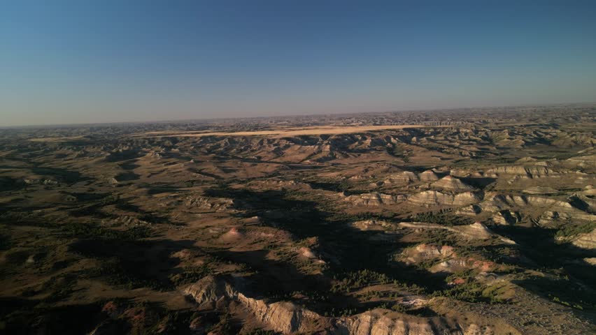 Aerial of Medora North Dakota badlands at sunset