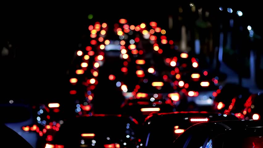 City traffic at night car light mooving blur