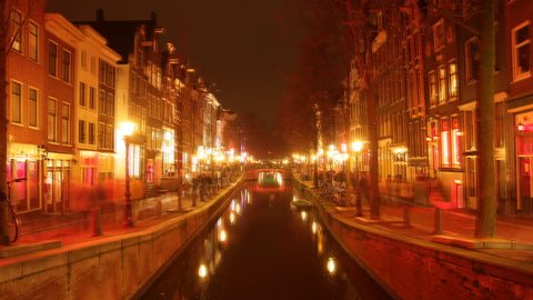 time-lapse shot of the red light district, amsterdam at night