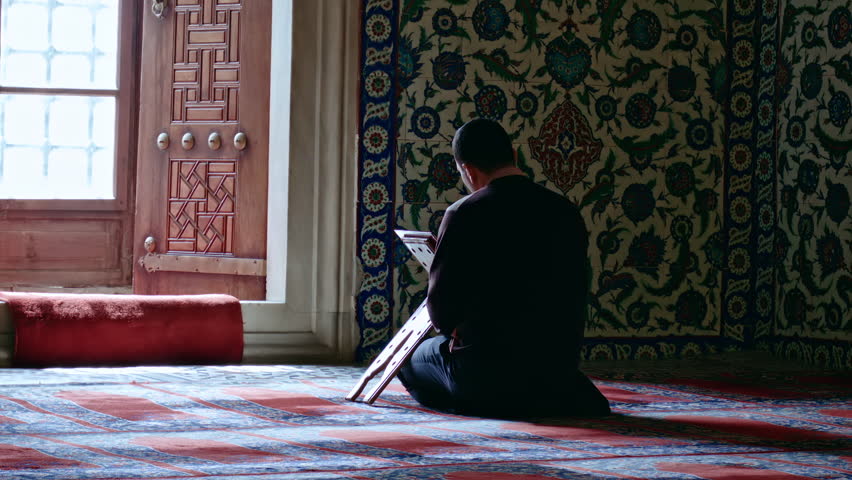 muslim-man-reading-quran-alone-in-mosque-freepik
