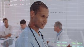 Animation of financial data processing over biracial male doctor using tablet. Global medicine, business, connections, computing and data processing concept digitally generated video. - Powered by Shutterstock - Get 15% off with code: PIKWIZARD15