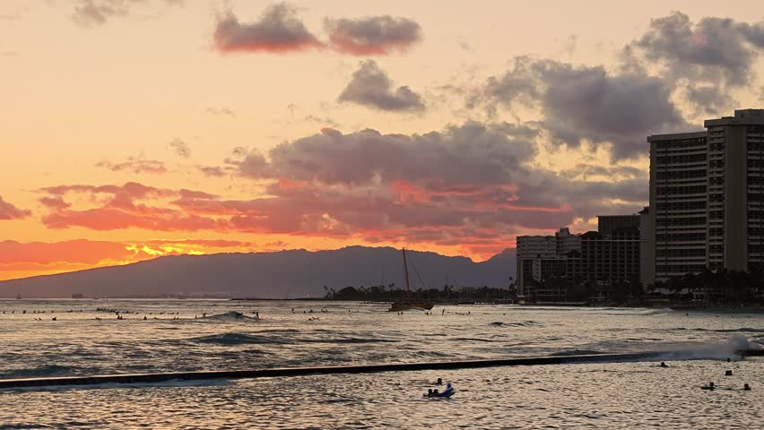 Waikiki Beach Sunset with Soft Waves and Orange Horizon, travel tropical vacatio