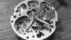 skeleton watch in operation close-up, black white video - Powered by Shutterstock - Get 15% off with code: PIKWIZARD15