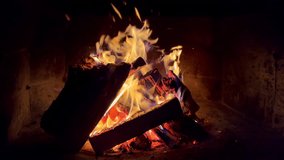 Slow motion 4K video of burning dry woods in the brick outdoor country house mantel at the cold autumn late evening. Home coziness and energy saving concept footage. - Powered by Shutterstock - Get 15% off with code: PIKWIZARD15