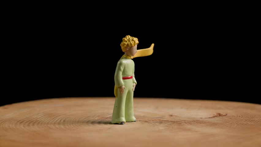 Real Footage of Little Prince Figurine Turnig. High quality 4k footage