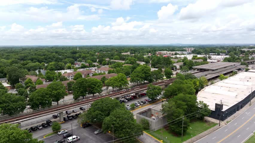 Metropolitan Atlanta Rapid Transit West End Station Subway station, Atlanta Georgia suburbs neighbourhood with urban parks and nature trails under clear sky, Drone shot