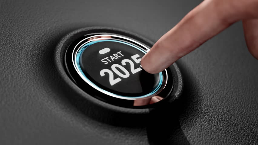 Finger about to press a car ignition button with the text 2025 start.happy new year 2025 start new project.concept of start with strategy,win,plan,goal and objective target