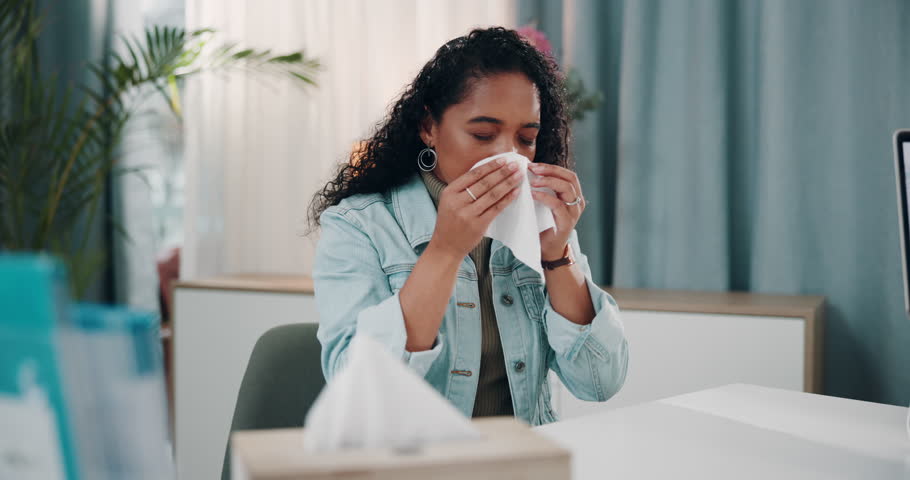 Sick woman, sinus and blowing nose with tissue for viral infection, sneeze or mucus at clinic. Frustrated, female person or patient with allergy, fever or virus for influenza, flu or cold at hospital
