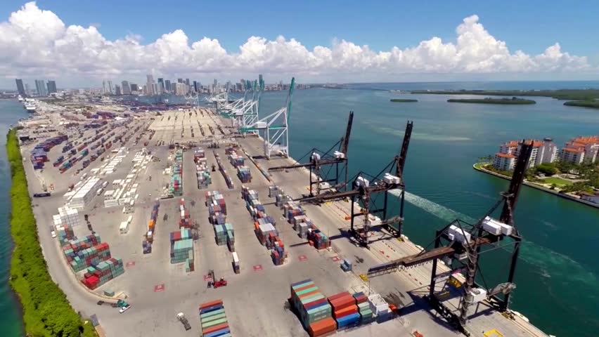 Long Beach, Thousands of commercial shipping containers on the port's ground waiting to be shipped, Container industrial and commercial trade port and skyline in Singapore. Aerial drone video, corport