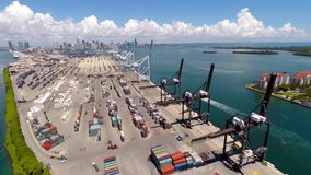 Long Beach, Thousands of commercial shipping containers on the port's ground waiting to be shipped, Container industrial and commercial trade port and skyline in Singapore. Aerial drone video, corport - Powered by Shutterstock - Get 15% off with code: PIKWIZARD15