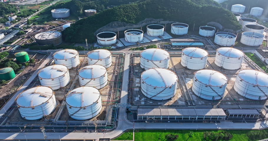 Aerial view of chemical plant oil tank industrial equipment on mountain side