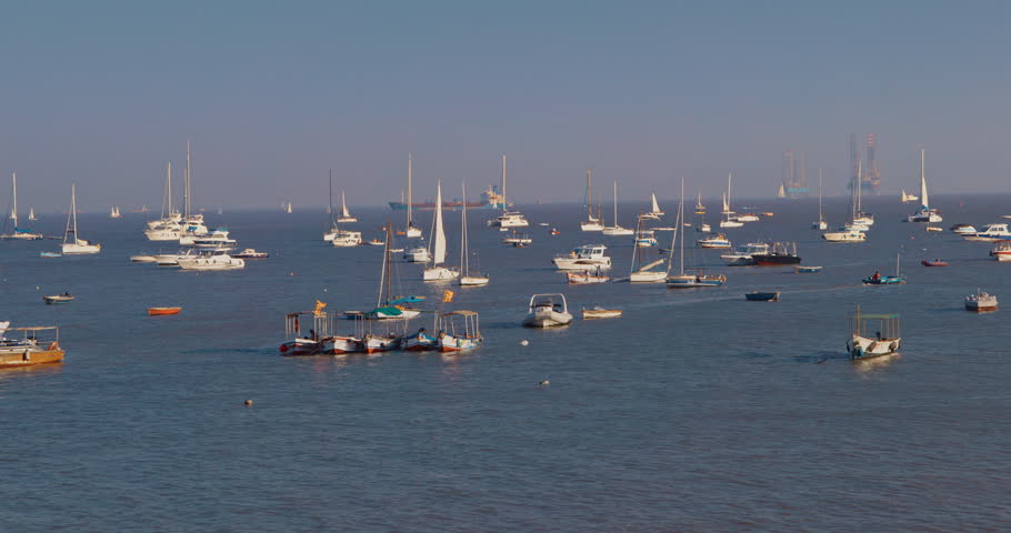 Mumbai, India.Panoramic View On Many Ships And Boats Drift In Mumbai Harbour Or Bombay Harbour Or Front Bay. Picturesque Bay Situated In Arabian Sea. Boat Floating On Arabian Sea. Indian Flag Flutters