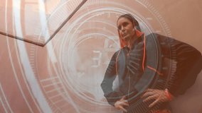 Digital clock animation over person in hoodie leaning against wall. Time, technology, urban, modern, city, youth - Powered by Shutterstock - Get 15% off with code: PIKWIZARD15