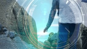 Futuristic digital interface animation over elderly couple hiking in mountains. Technology, adventure, fitness, outdoors, nature, health - Powered by Shutterstock - Get 15% off with code: PIKWIZARD15