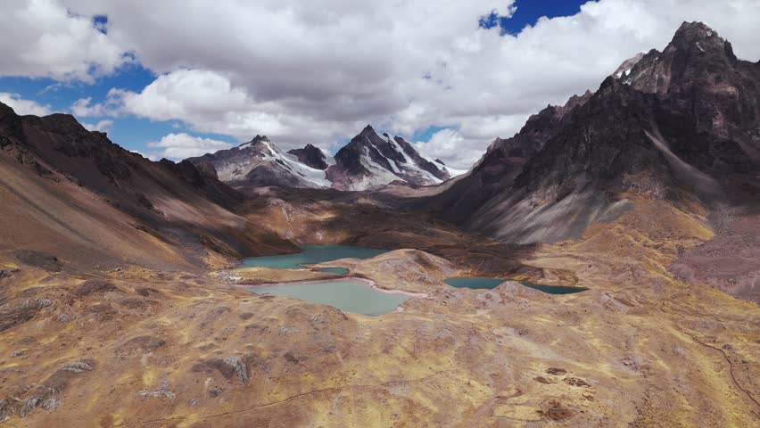 Seven lagoons of the Ausangate snow-capped mountain, Cusco Peru from drone