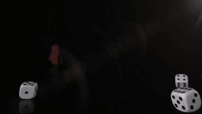 Rolling dice and bright light animation over dark background. Gambling, glowing, casino, luck, game, chance - Powered by Shutterstock - Get 15% off with code: PIKWIZARD15