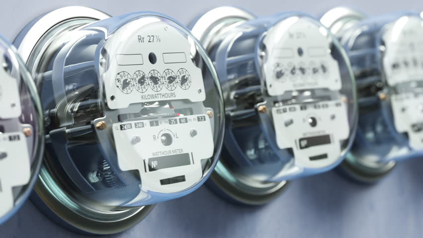 Electric meters in a row measuring power use. Electricity consumption concept. Looped 3d animation. 3D Illustration