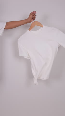 T-shirts are being tossed around to show off the beautiful fabric.