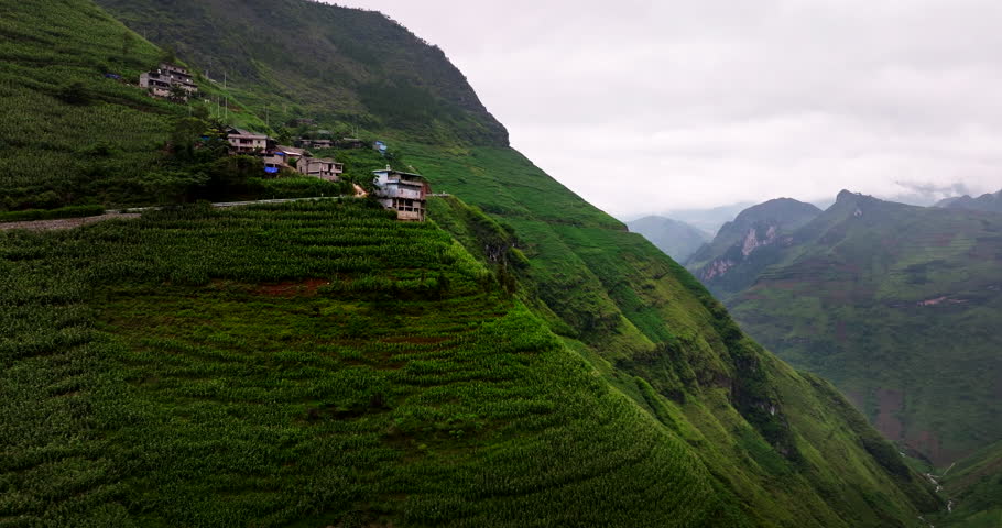 Architectures At Towering Mountainside Of Meo Vac Valley Over Nho Que River In Vietnam. Aerial Drone Shot