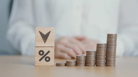 wood block of percentage change to UP and Down arrow with money coins stack. Interest rate, GDP, stocks market, financial, deflation and Inflation, ranking, mortgage, debt, Loan and Economic Recession - Powered by Shutterstock - Get 15% off with code: PIKWIZARD15